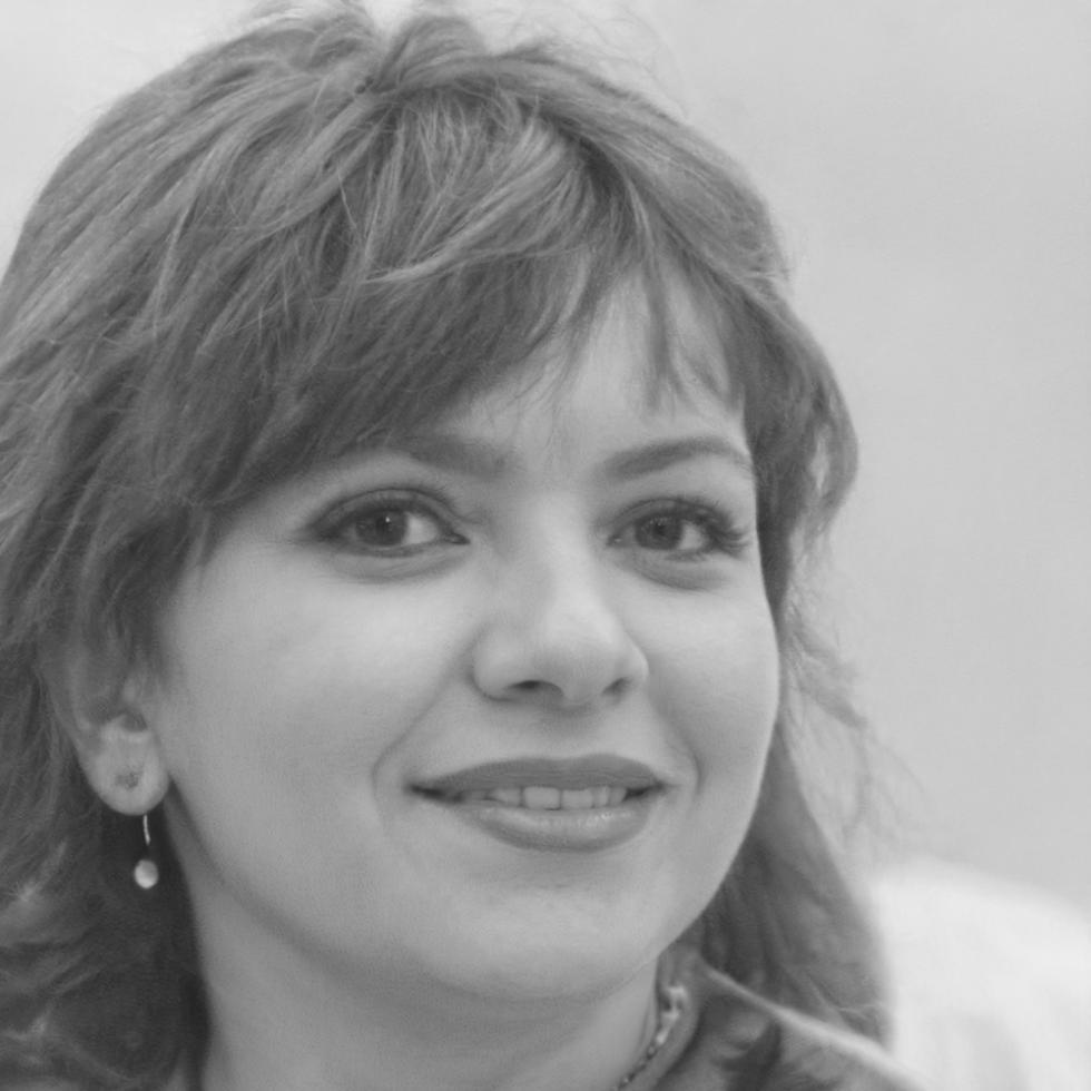 Professional headshot of financial expert